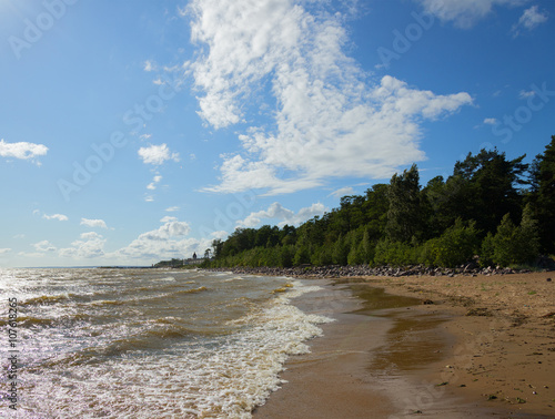 Sunny windy day with clouds photo