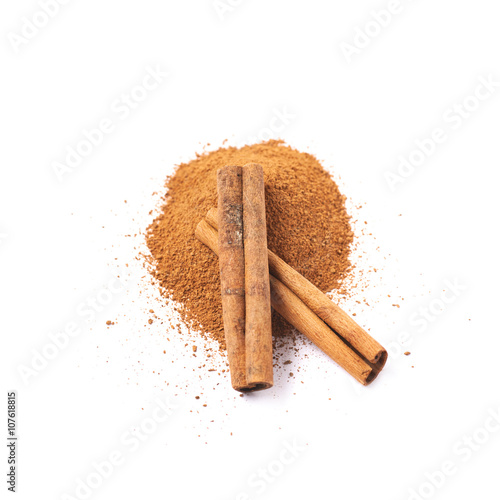 Pile of cinnamon powder isolated