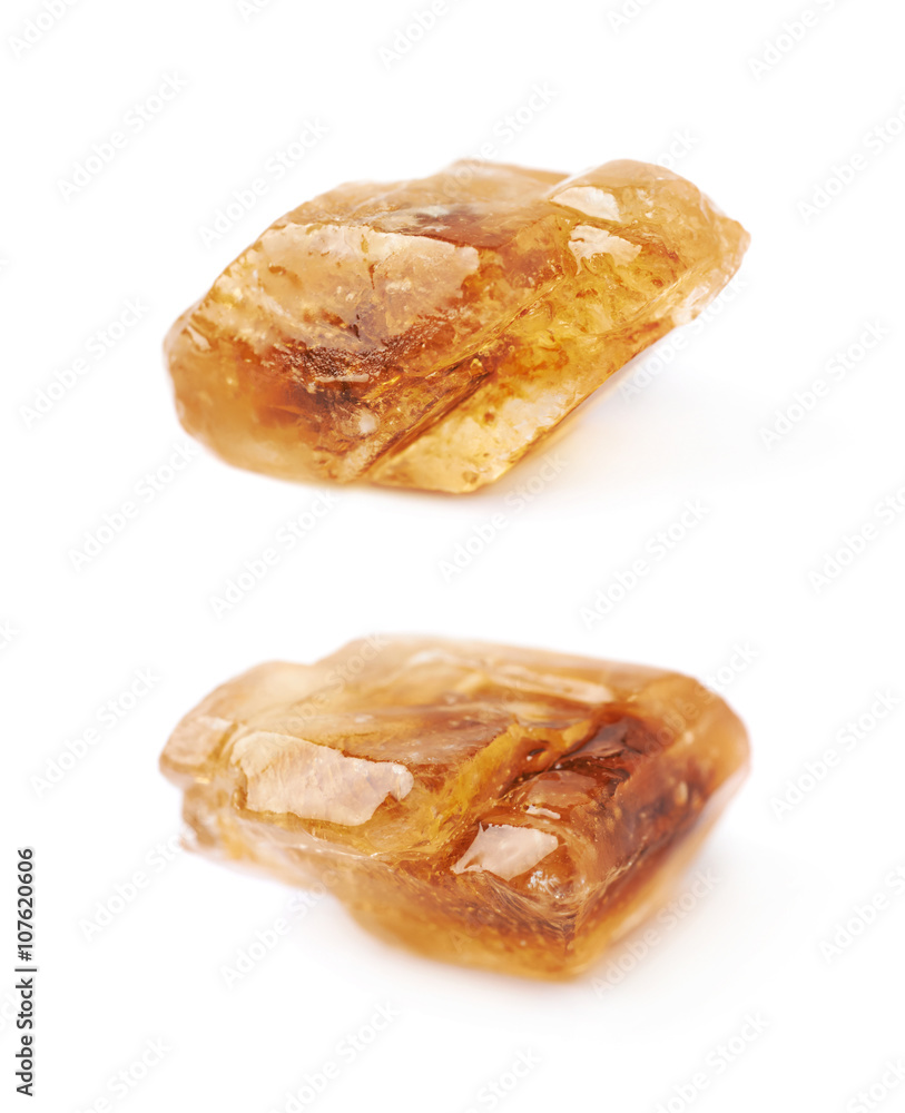 Single rock sugar crystal isolated Single rock sugar crystal isolated