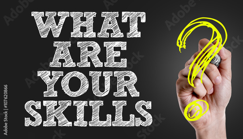 Hand writing the text: What Are Your Skills?