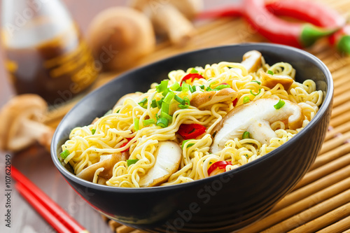 Instant noodles with shiitake mushrooms in a bowl, Asian traditional food