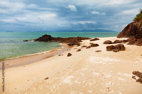 Lonely beach on Koh Samui island in Thailand. Cloudy day