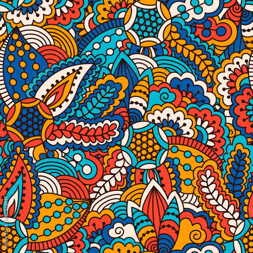 Hand drawn seamless pattern with floral elements. Colorful ethnic background. Pattern can be used for fabric  wallpaper or wrapping