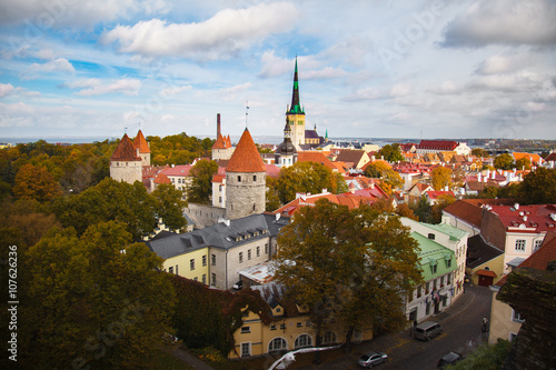 Top view on historic centre of Tallinn, Estonia. Red roofs of the old houses of the European city Tallinn. The ancient architecture. Roof with wings.