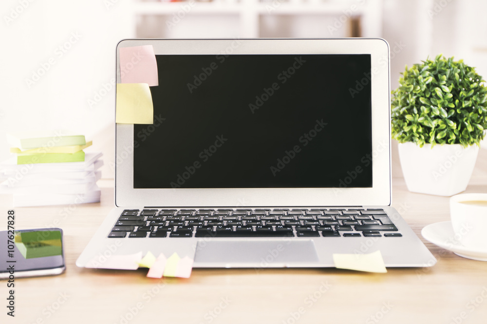 Fototapeta premium Desktop with laptop and phone