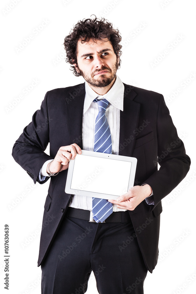 Businessman holding a blank screen tablet Businessman holding a blank screen tablet