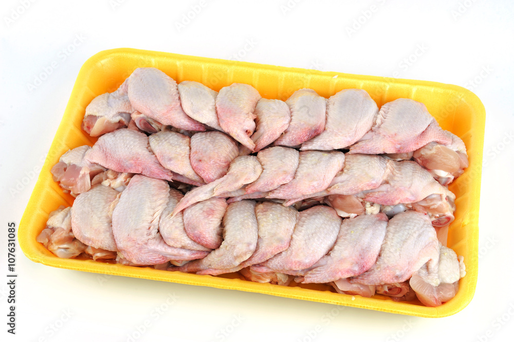 fresh chicken wings in container
