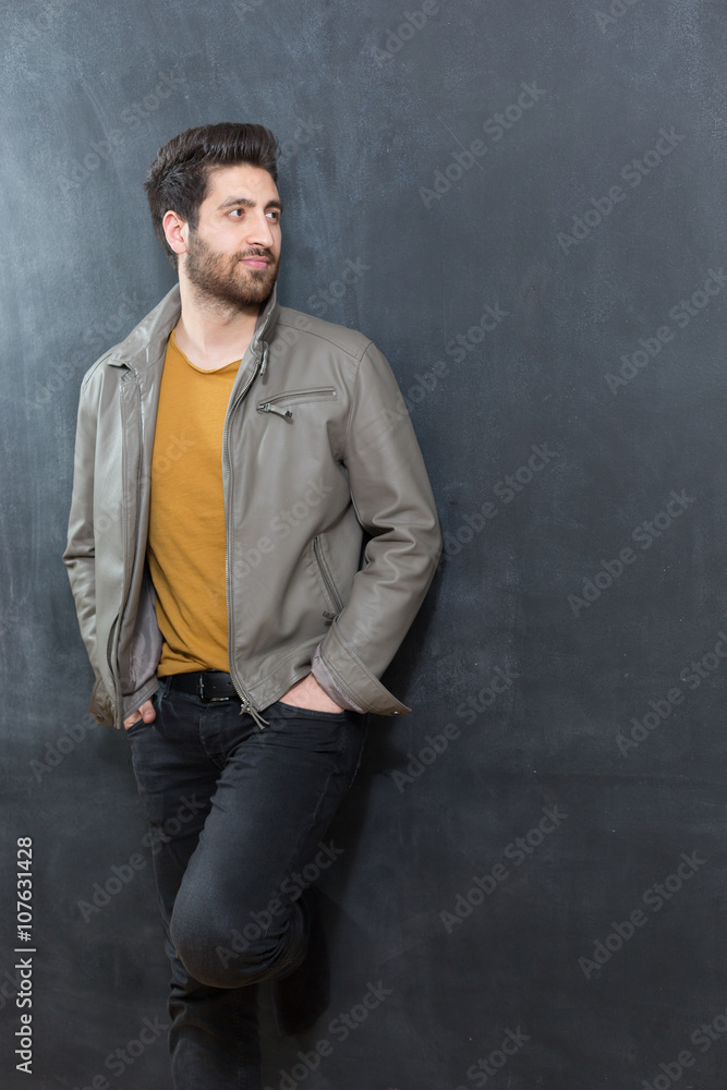 Portrait of masculinity. Portrait of handsome young bearded mans Portrait of masculinity. Portrait of handsome young bearded mans