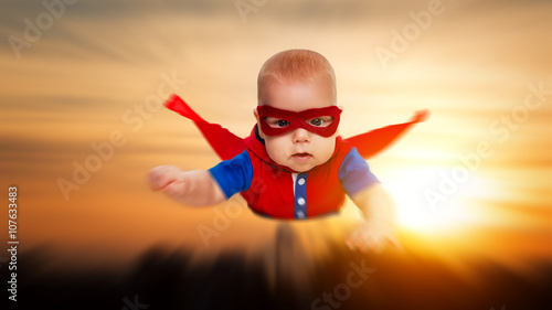 toddler little baby superman superhero with a red cape flying th