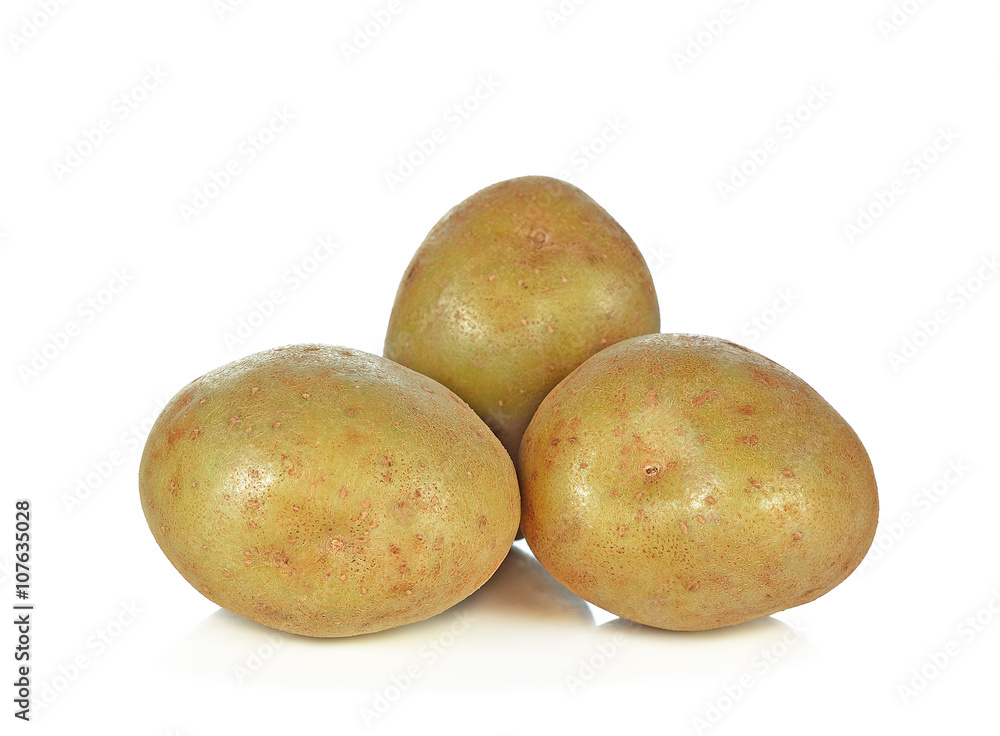 Potatoes on the white background. New harvest Potatoes on the white background. New harvest