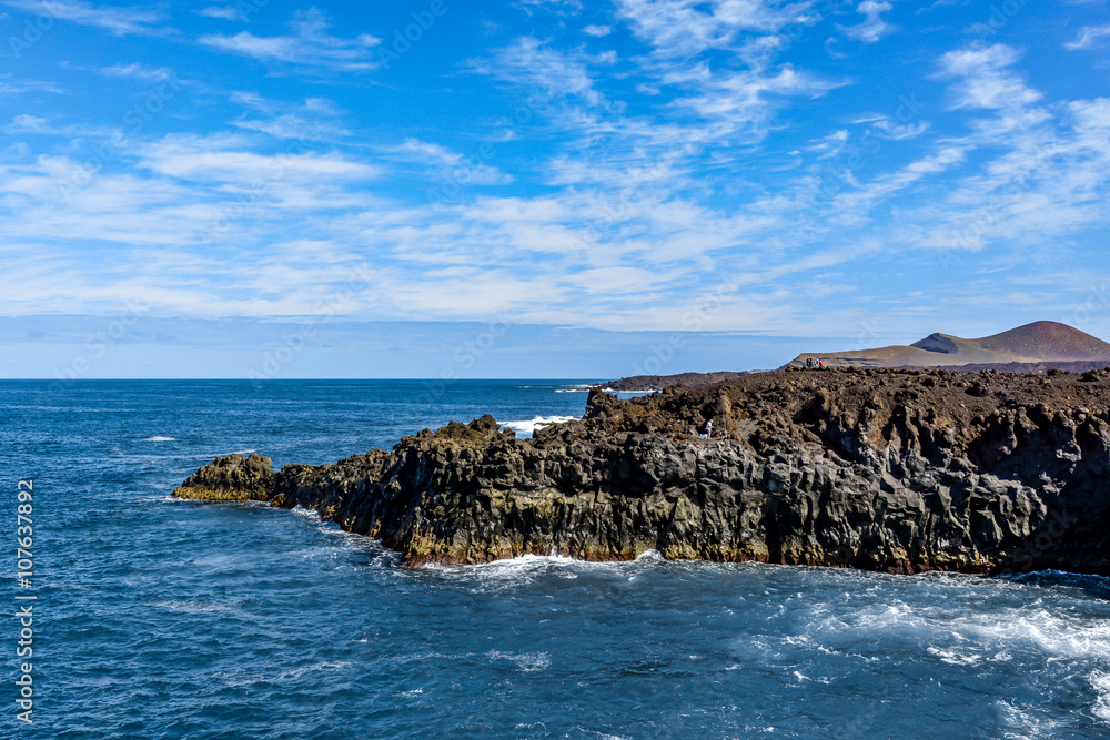 Los Hervideros, a place where lava streamed into the ocean, one of the most famous tourist attractions on Lanzarote island, Spain