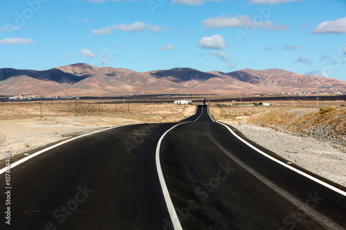 Straight road on Fuerteventura. Canary Islands, Spain photo