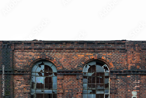 Municipal Slaughterhouse (Mestska jatka), Ostrava, Czech Republic. Former beautiful industrial building, now abandoned brownfield area - detail of broken windows and red brick facade photo
