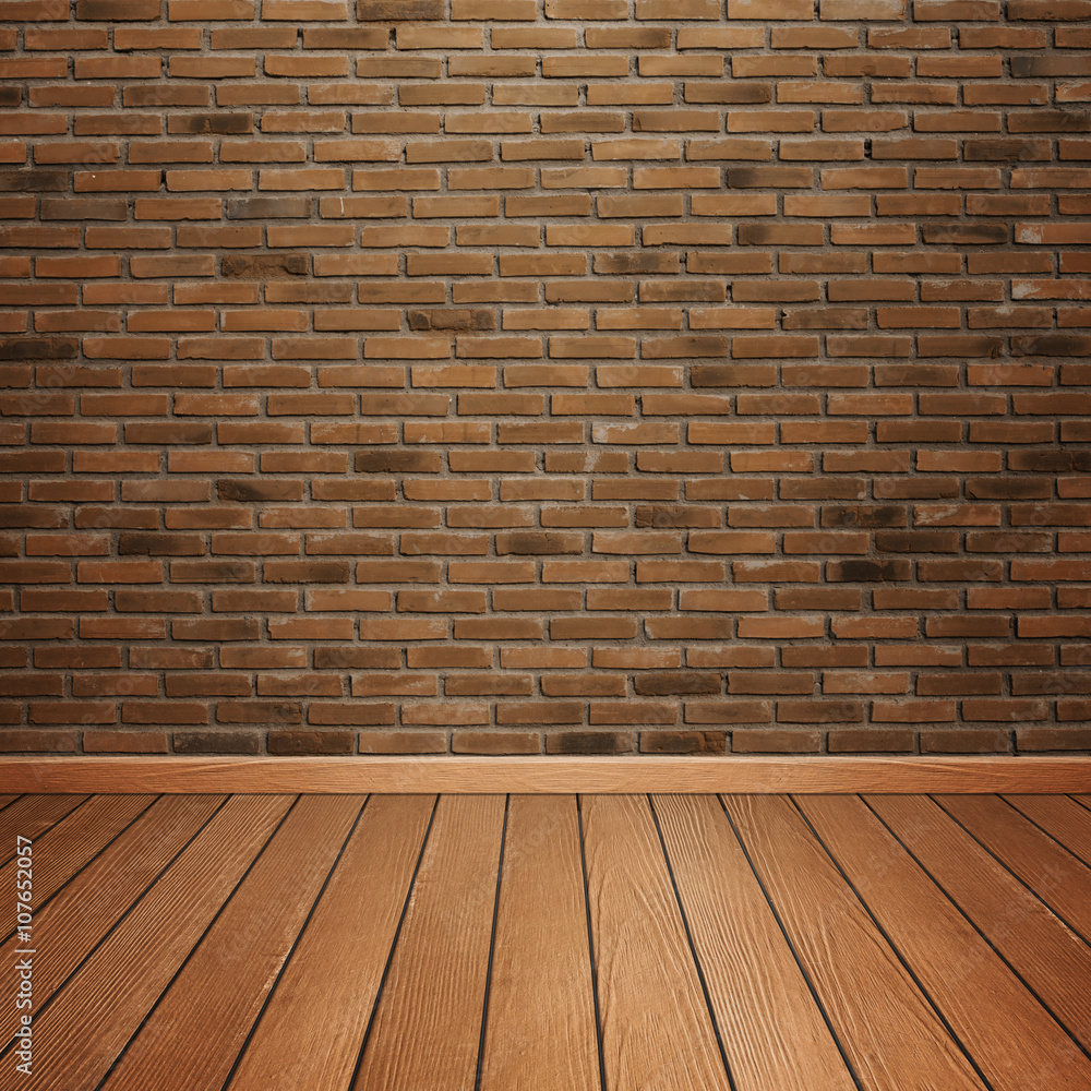 room interior with brick wall and wood floor