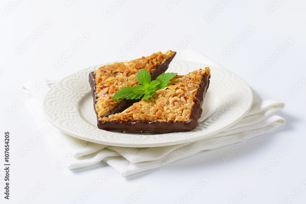Triangle nut bars dipped in chocolate Triangle nut bars dipped in chocolate