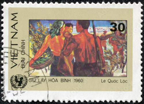 stamp printed in Vietnam shows pickers harvest