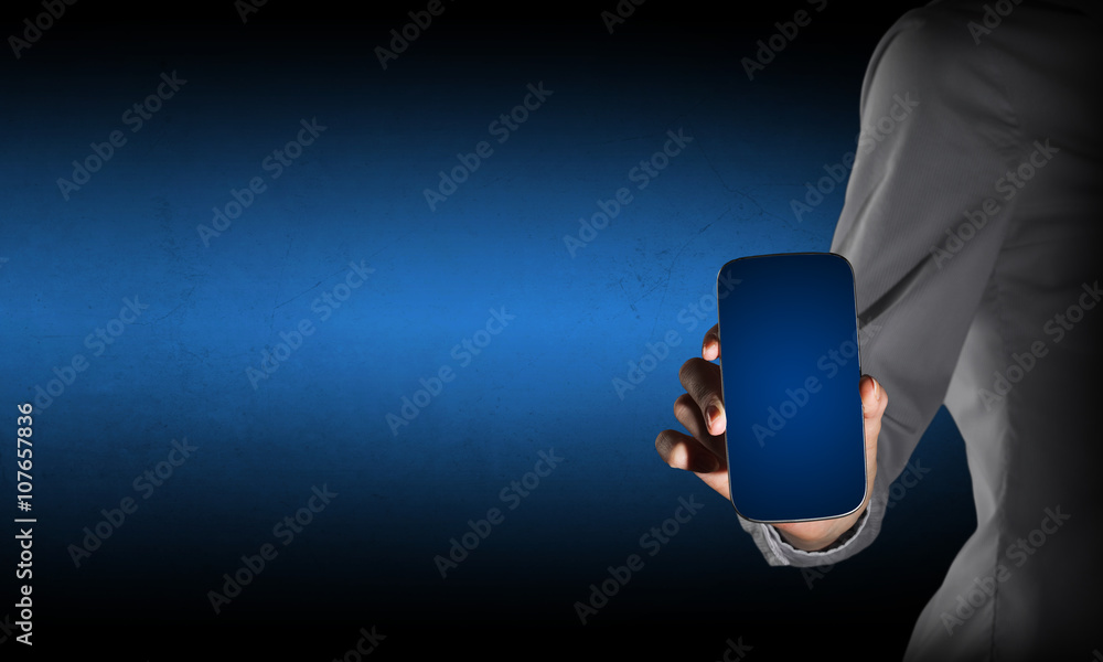 Businessperson showing mobile phone