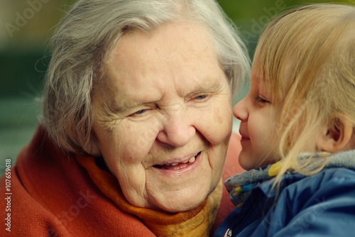 Obraz na płótnie Grandmother and granddaughter. Happy family. w salonie