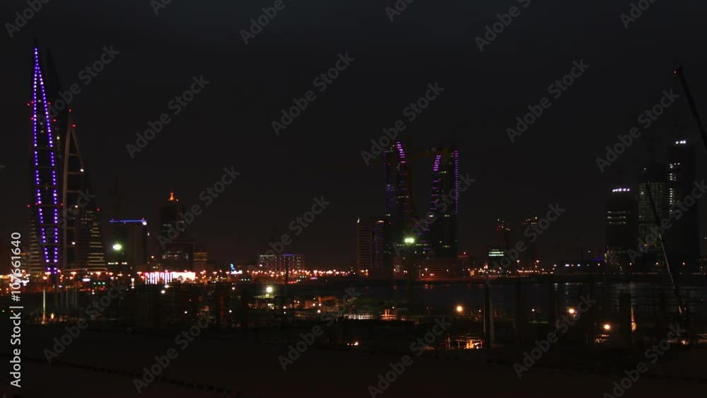 Construction Site in Manama. Timelapse at Dusk. City Skyline on the background. Camera Pan. Construction Site in Manama. Timelapse at Dusk. City Skyline on the background. Camera Pan.