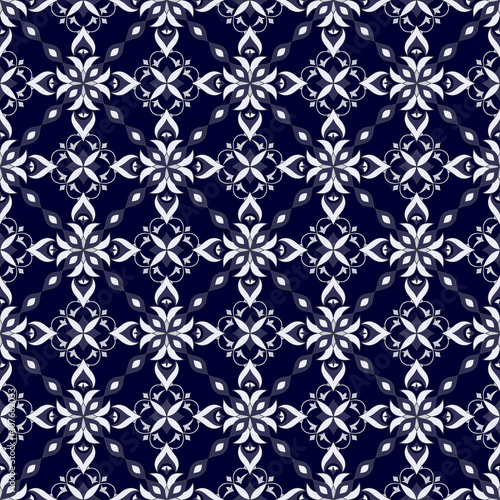White decorative seamless texture on dark blue.