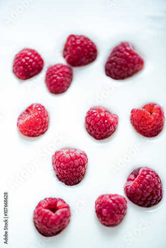 Yoghurt background with raspberries  copy space template