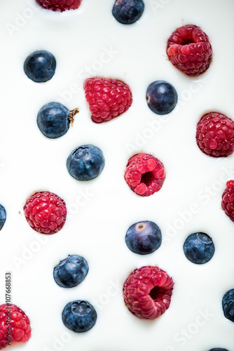 Wallpaper Mural Food background, raspberries and blueberies on yoghurt Torontodigital.ca
