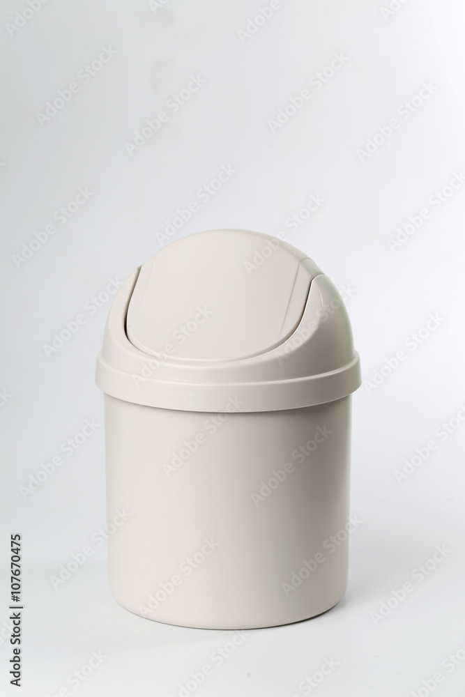 A wastepaper basket In front of a white background A wastepaper basket In front of a white background
