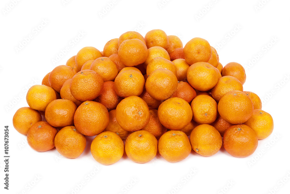 Heap of lush textured mandarins isolated on the white background