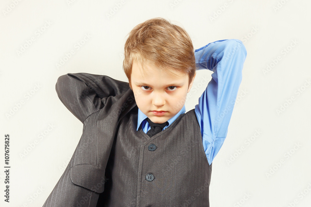 Little stylish boy wears on a elegant suit Little stylish boy wears on a elegant suit