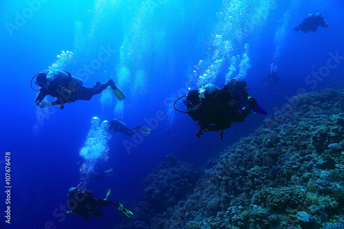 unusual photo diver underwater background