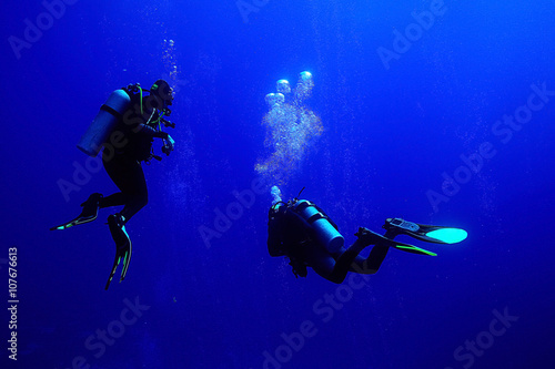 Wallpaper Mural unusual photo diver underwater background Torontodigital.ca