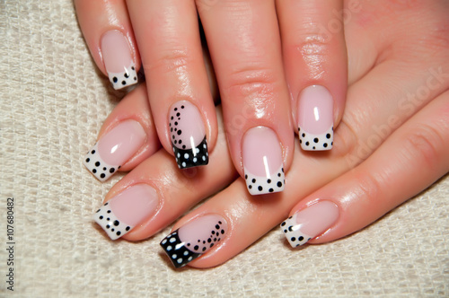 fun black and white polka dot manicure
