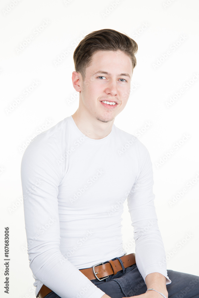 Casual young man looking at camera seems confident Casual young man looking at camera seems confident