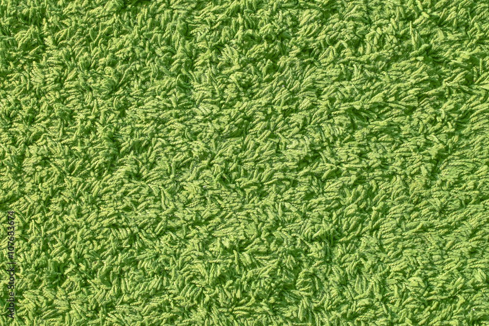 Closeup green yarn carpet Closeup green yarn carpet