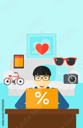 Man shopping online using his laptop.