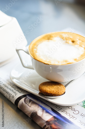 Morning coffee on cafe table photo