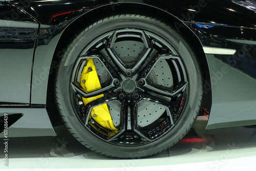 Super car disc brake. Car wheels. steel alloy car disks backgrou © chat_a4