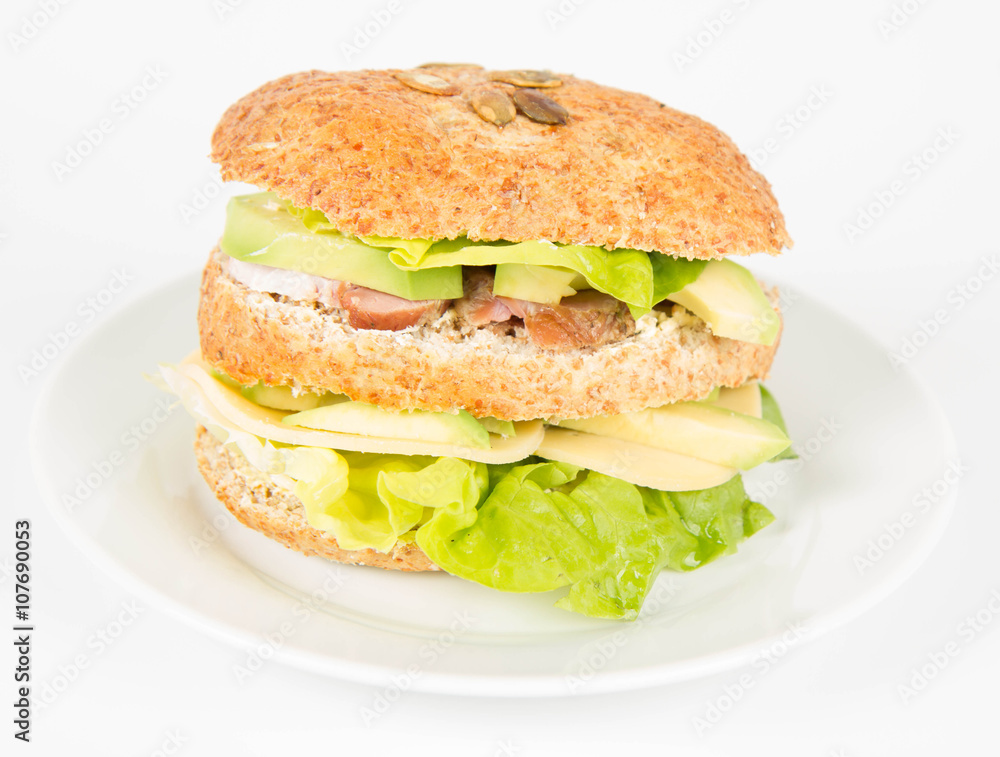 Sandwich with cheese, avocado, sirloin and lettuce Sandwich with cheese, avocado, sirloin and lettuce