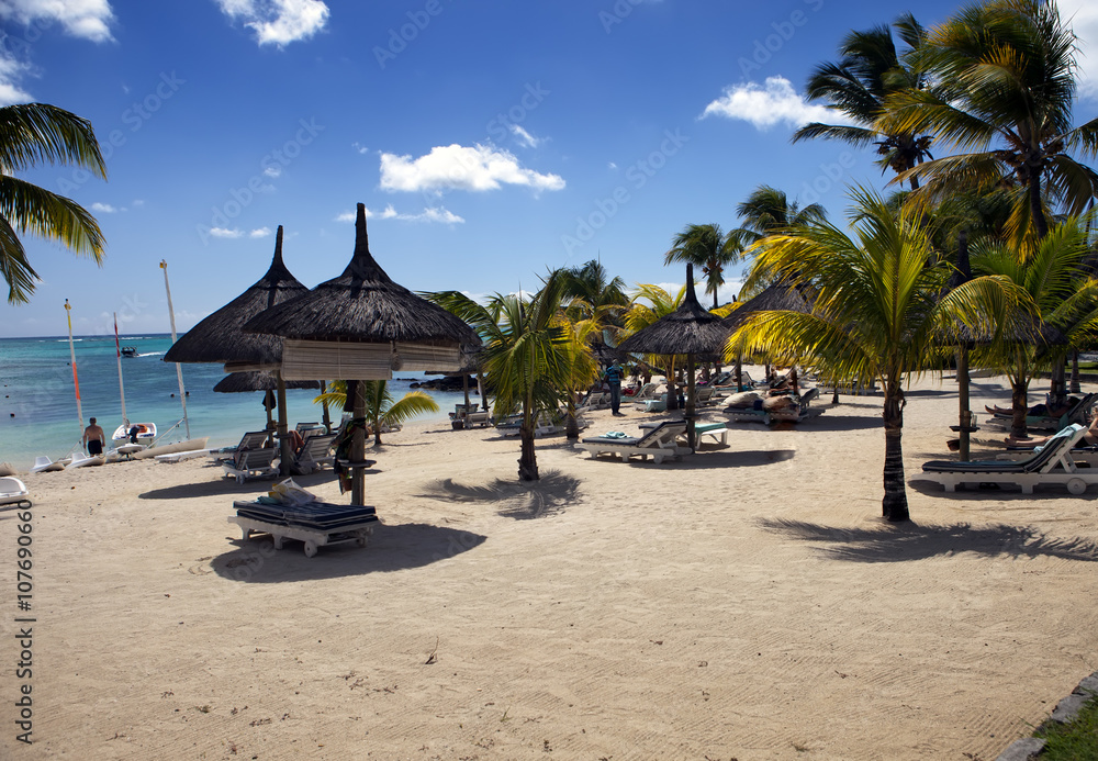 Sun protection umbrellas, beach, sea. Mauritius..