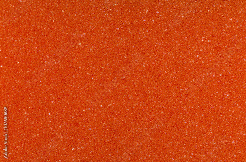 Orange spongy macro background