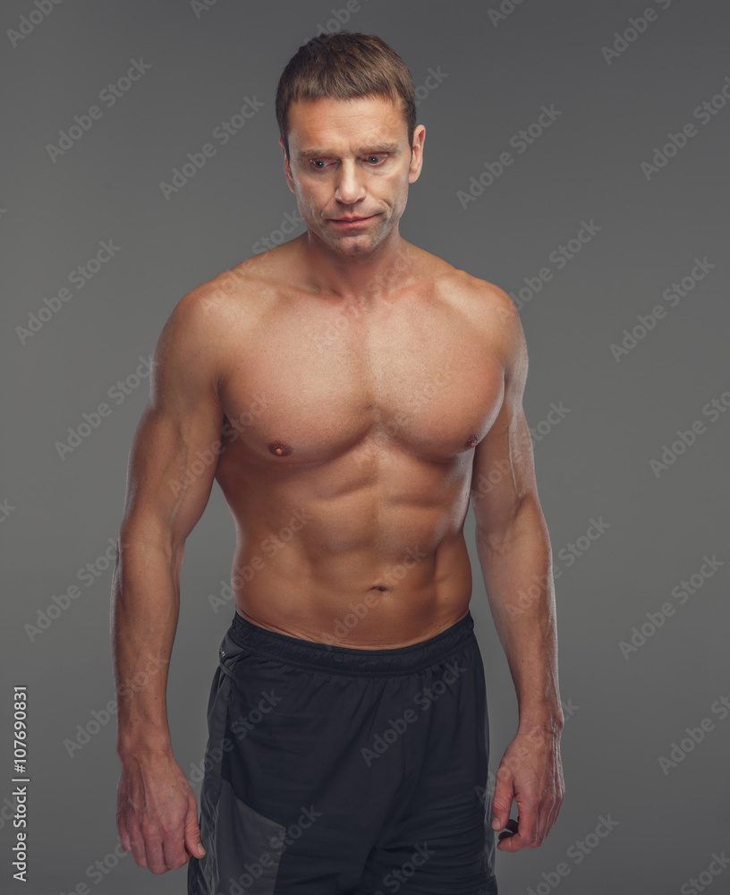 Fototapeta premium Shirtless muscular middle age man.