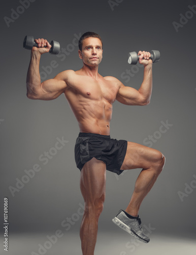 A man training with dumbbells.