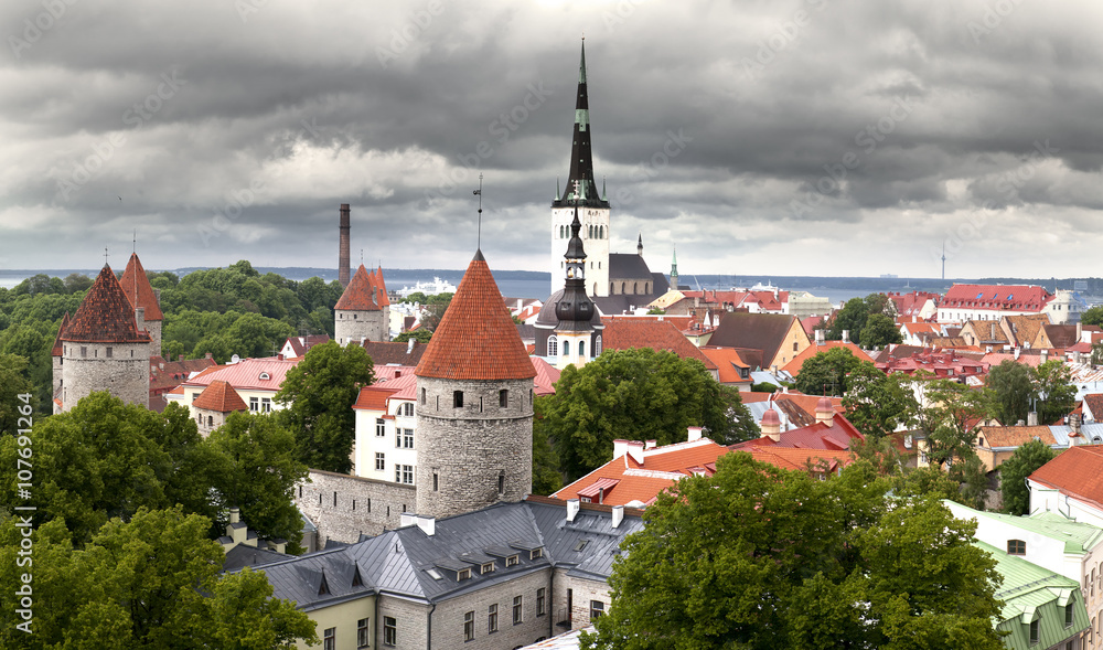 View of Old city's roofs under the storm sky. Tallinn. Estonia.