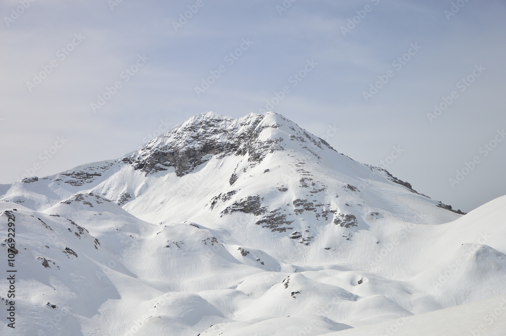 Winter snow covered mountain peaks in Europe