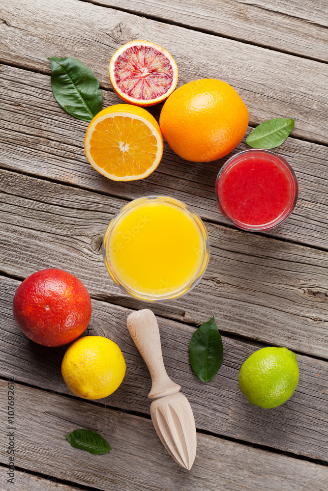 Fresh ripe citruses and juice. Lemons, limes and oranges Fresh ripe citruses and juice. Lemons, limes and oranges