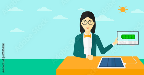 Solar panel charging tablet computer.