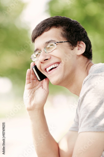 Guy talking on mobile phone