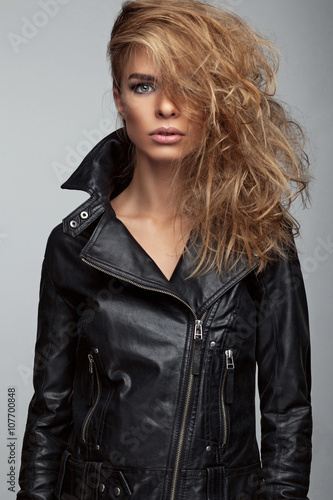 Fashion shoot of girl with beautiful hair style in a leather jacket
