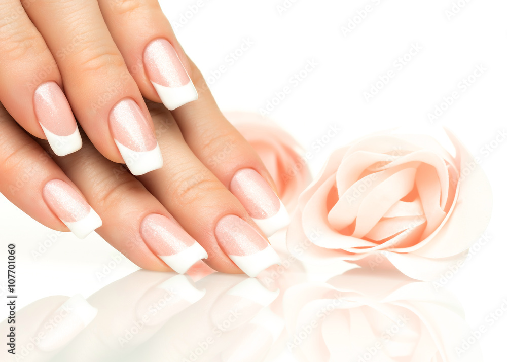 Fotografia Woman hands with french manicure close-up su EuroPosters.it
