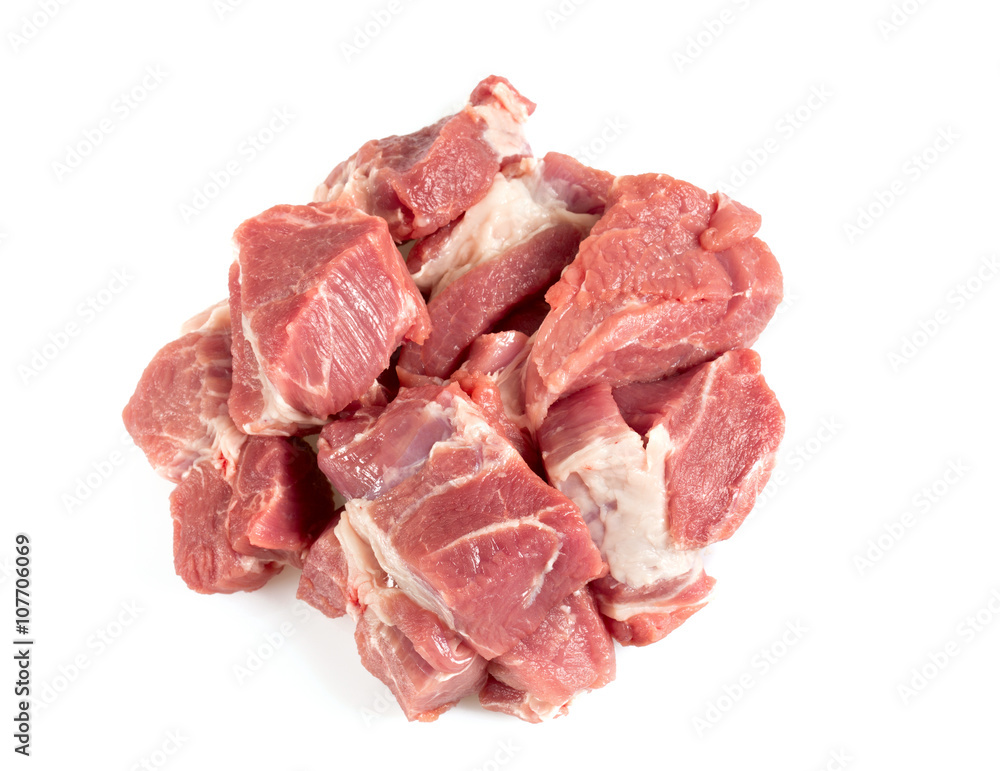 raw pork neck meat cut in pieces isolated on white raw pork neck meat cut in pieces isolated on white
